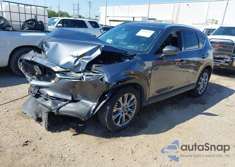 2020 Mazda Cx-5 Signature z USA, uszkodzony, nr VIN JM3KFBEY2L0835353